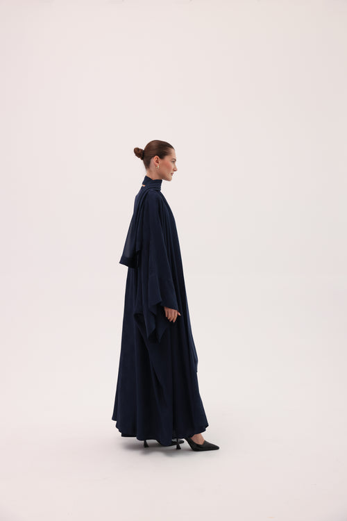 Side view of the CIELO luxury navy blue silk abaya by Tre Sorelle.